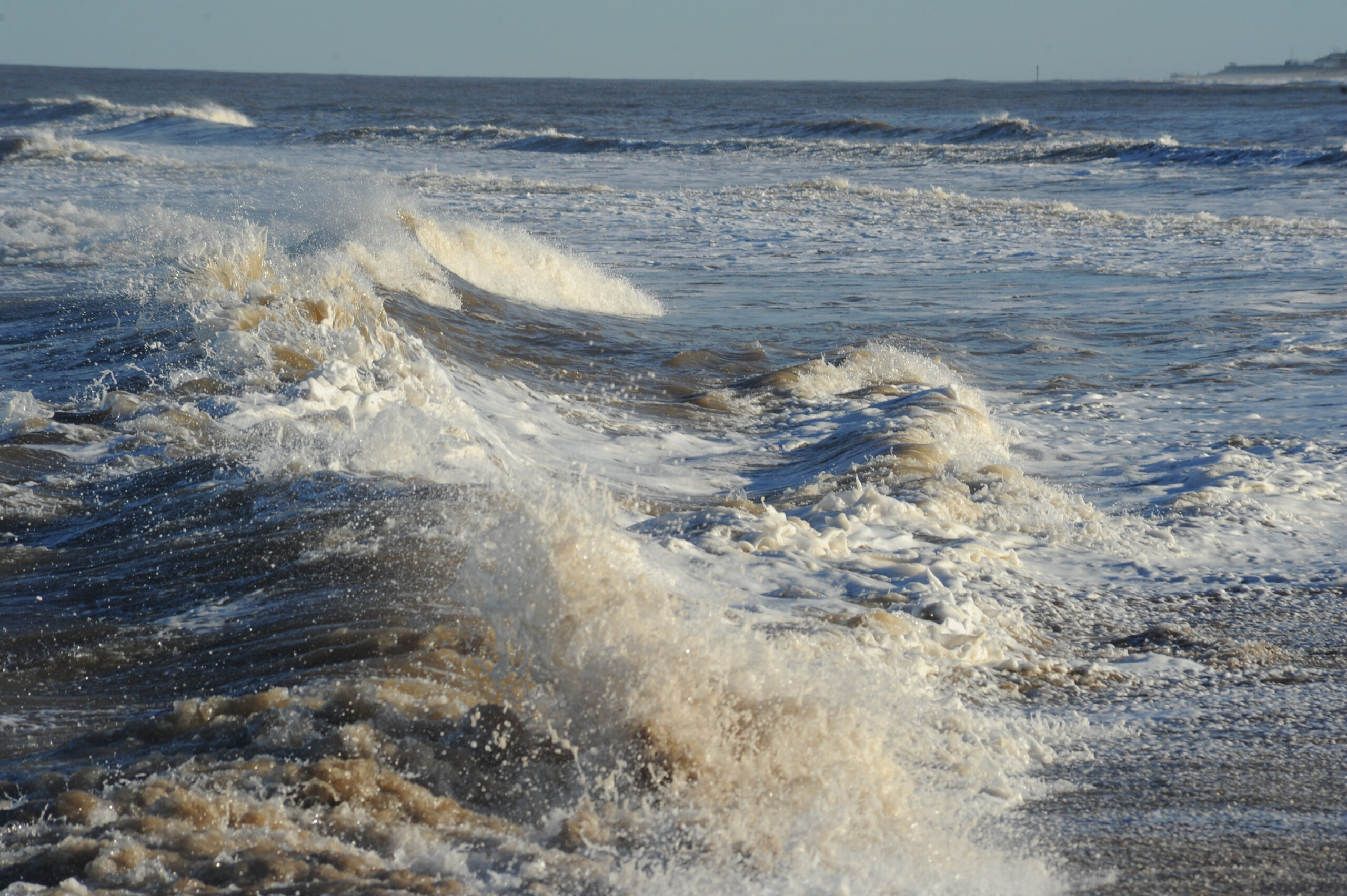 Rough sea with strong waves and sea spray